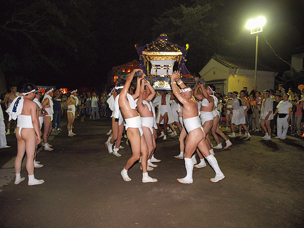 回転する神輿差し